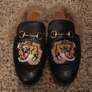 Gucci slippers.